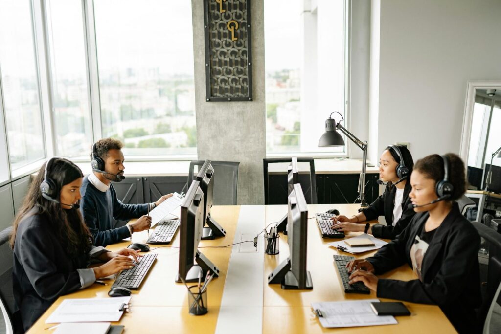 Call center agent at headset taking inbound call